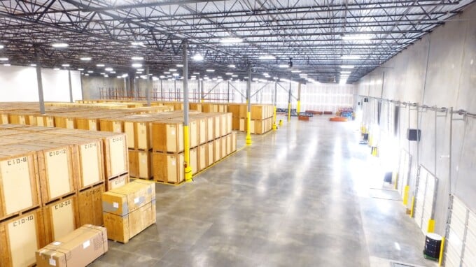 photo of clean, well-organized warehouse with crates of residential goods