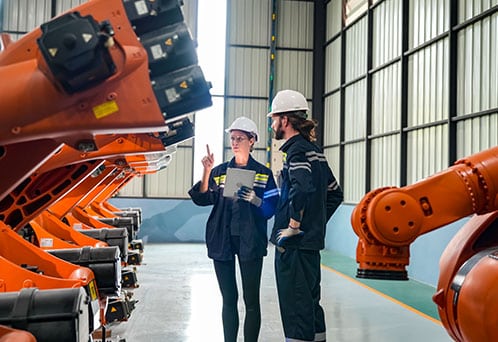 Program manager visits industrial site.