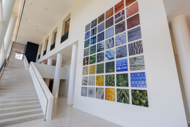 Lobby artwork installation at Virginia Guesthouse